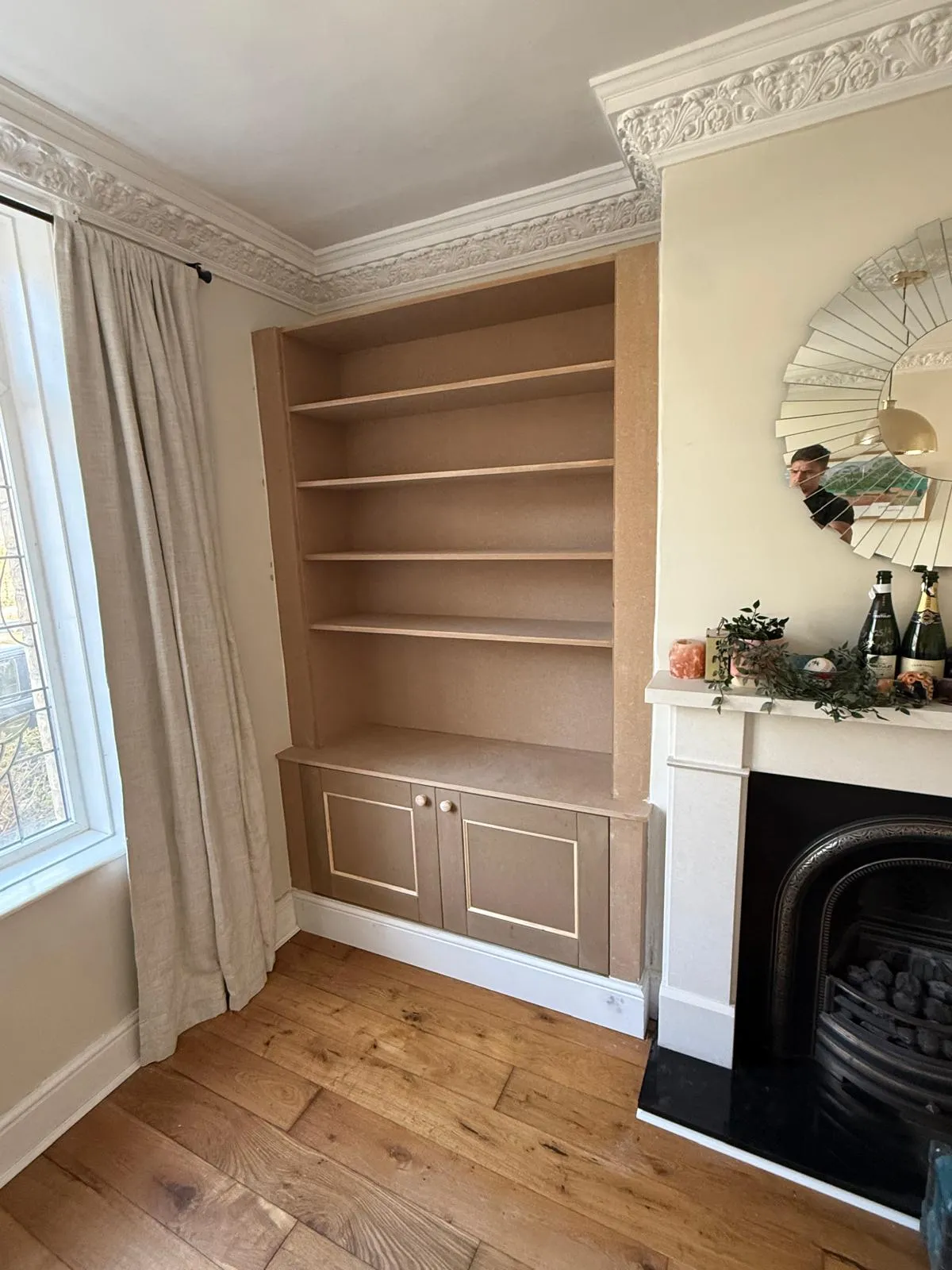 Victorian living room built-in alcove bookcase and storage